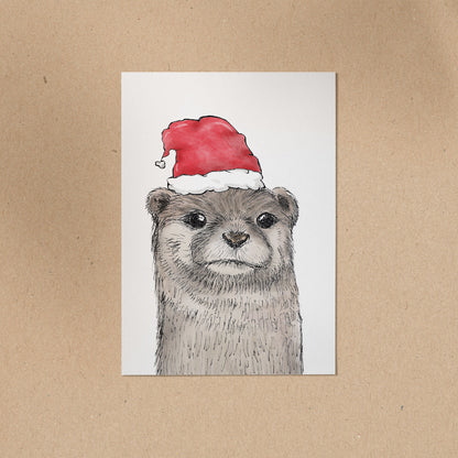 Postkarte | Otter Fiete - Weihnachtsmütze | Aquarell